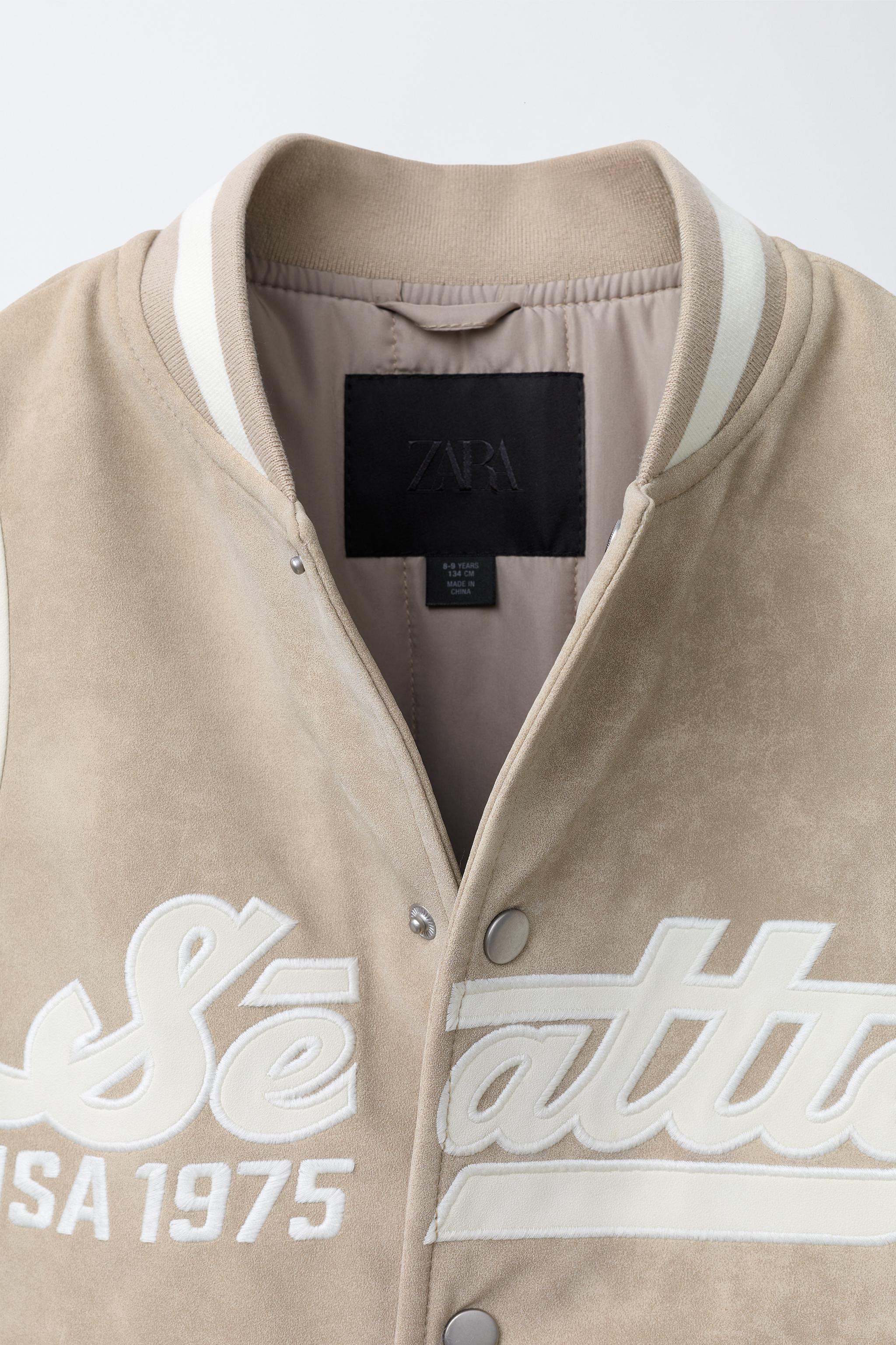 BLOUSON BOMBER EFFET DAIM AVEC INSCRIPTION